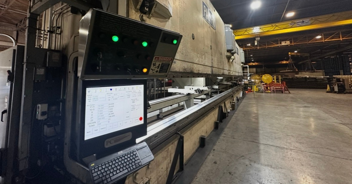 Press brake with Pacific Press logo on top, control panel in the corner of picture